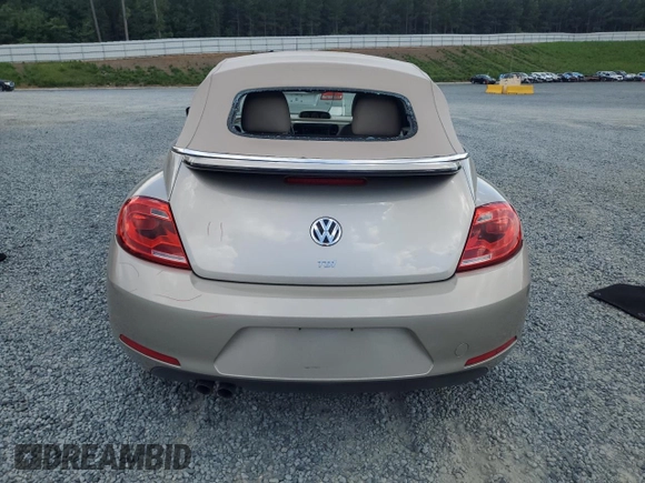 2015 Volkswagen Beetle with VIN 3VW5A7AT9FM815899, listed as a Copart auction lot 63074125 with 77,214 mi miles and Salvage title. Bid and sale history available at DreamBid. Image 6.