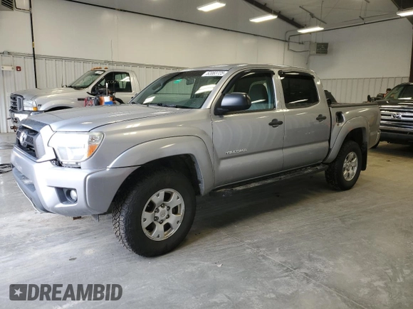 2015 Toyota Tacoma with VIN 3TMLU4EN7FM170049, listed as a Copart auction lot 52083725 with 162,062 mi miles and Salvage Title. Bid and sale history available at DreamBid. Image 1.