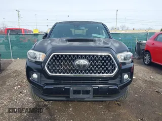 2018 Toyota Tacoma SR5 with VIN 3TMAZ5CN6JM055632, listed as a IAAI auction lot 40751593 with 125,663 mi miles and . Bid and sale history available at DreamBid. Image 13.