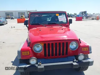 2001 Jeep Wrangler Sport with VIN 1J4FA49S11P375854, listed as a IAAI auction lot 42334037 with 215,027 mi miles and . Bid and sale history available at DreamBid. Image 6.