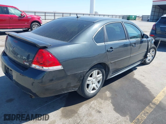 2013 Chevrolet Impala LT with VIN 2G1WB5E31D1163179, listed as a IAAI auction lot 41908130 with 190,801 mi miles and . Bid and sale history available at DreamBid. Image 4.