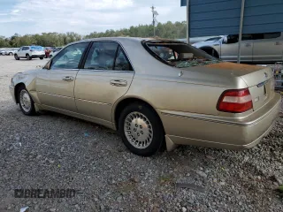 2000 Infiniti Q45 z VIN JNKBY31A0YM301297, wystawiony jako Copart lot #74672884 z przebiegiem 171 263 mil mil oraz Szkody całkowita. Historia ofert i sprzedaży dostępna na DreamBid. Obrazek 2.