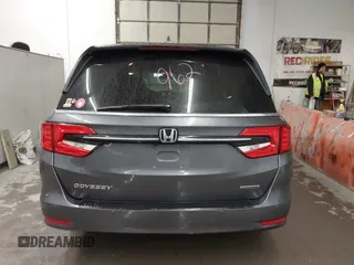 2021 Honda Odyssey Touring with VIN 5FNRL6H86MB026038, listed as a IAAI auction lot 41735249 with 68,480 mi miles. Bid and sale history available at carsss.com. Image 16.