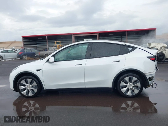 2020 Tesla Model Y Long Range z VIN 5YJYGDEE3LF043800, wystawiony jako IAAI lot #41590220 z przebiegiem 62 341 mil mil oraz . Historia ofert i sprzedaży dostępna na DreamBid. Obrazek 15.