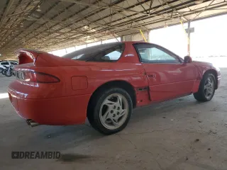 1999 Mitsubishi 3000GT z VIN JA3AM44H3XY001394, wystawiony jako Copart lot #75942814 z przebiegiem 75 146 mil mil oraz Tytuł czysty. Historia ofert i sprzedaży dostępna na DreamBid. Obrazek 3.