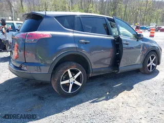 2018 Toyota RAV4 LE with VIN JTMBFREV0JJ722483, listed as a IAAI auction lot 41982973 with 83,012 mi miles. Bid and sale history available at carsss.com. Image 4.