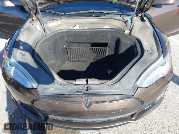 2014 Tesla Model S 60 with VIN 5YJSA1H17EFP33275, listed as a IAAI auction lot 41778167 with 202,749 mi miles and . Bid and sale history available at DreamBid. Image 10.