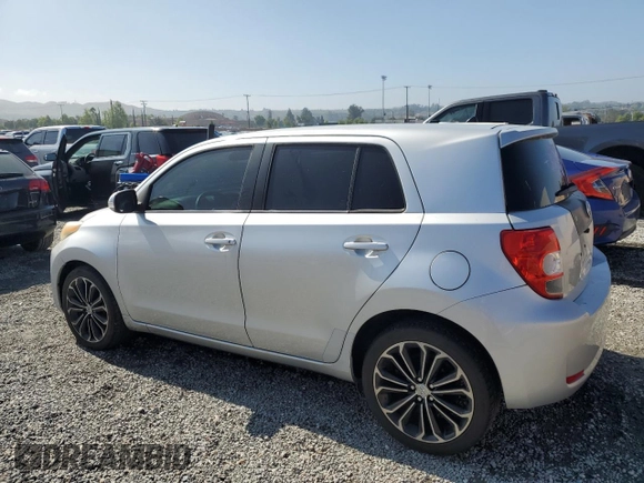 2010 Scion xD with VIN JTKKU4B40A1005613, listed as a Copart auction lot 56074605 with 205,505 mi miles and Clean Title. Bid and sale history available at DreamBid. Image 2.