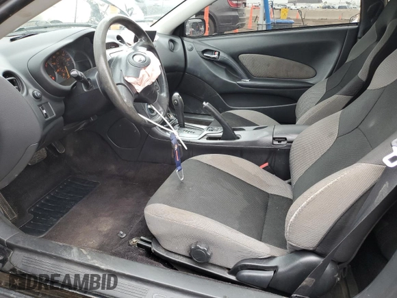 2004 Toyota Celica GT with VIN JTDDR32T540174376, listed as a Copart auction lot 54751115 with 85,335 mi miles and Salvage Title. Bid and sale history available at DreamBid. Image 7.