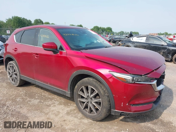 2018 Mazda CX-5 Grand Touring with VIN JM3KFBDM2J0448555, listed as a IAAI auction lot 42449282 with 65,770 mi miles and . Bid and sale history available at DreamBid. Image 1.