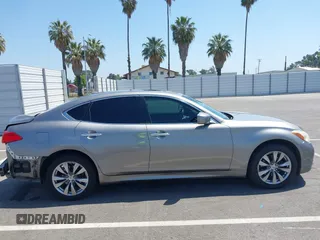 2012 Infiniti M with VIN JN1BY1AR3CM391052, listed as a IAAI auction lot 42178760 with 198,116 mi miles and . Bid and sale history available at DreamBid. Image 14.