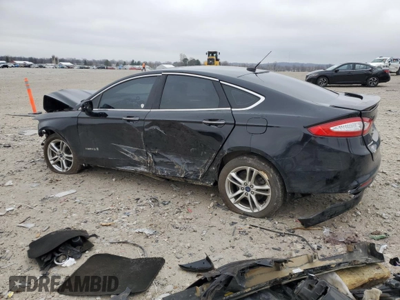 2016 Ford Fusion Titanium Hybrid z VIN 3FA6P0RU6GR139495, wystawiony jako Copart lot #52381235 z przebiegiem 138 534 mil mil oraz Czysty tytuł • Clean title. Historia ofert i sprzedaży dostępna na DreamBid. Obrazek 2.