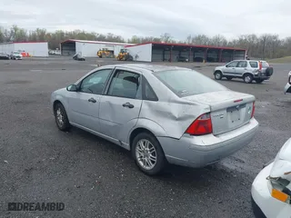 2007 Ford Focus S with VIN 1FAHP34N47W261179, listed as a IAAI auction lot 41931042 with 216,400 mi miles. Bid and sale history available at carsss.com. Image 3.