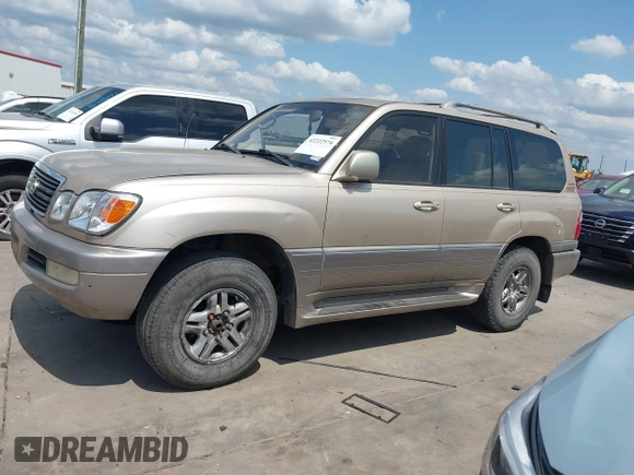 2001 Lexus LX 470 with VIN JTJHT00W713511796, listed as a IAAI auction lot 42222574 with 297,427 mi miles and . Bid and sale history available at carsss.com. Image 14.