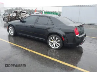 2015 Chrysler 300 C with VIN 2C3CCAEG8FH786879, listed as a IAAI auction lot 41563321 with 130,060 mi miles and . Bid and sale history available at carsss.com. Image 3.