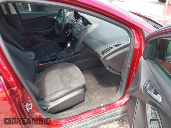 2017 Ford Focus SE z VIN 1FADP3F23HL313857, wystawiony jako IAAI lot #42181530 z przebiegiem 93 478 mil mil oraz . Historia ofert i sprzedaży dostępna na DreamBid. Obrazek 5.