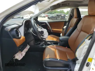 2016 Toyota RAV4 Limited with VIN JTMDJREV9GD027207, listed as a Copart auction lot 60350255 with 144,345 mi miles and Salvage title. Bid and sale history available at DreamBid. Image 7.