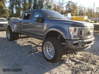 2022 Ford Super Duty F-450 DRW XL with VIN 1FT8W4DT8NEE62457, listed as a Copart auction lot 69064714 with 49,931 mi miles and Salvage Title. Bid and sale history available at carsss.com. Image 4.
