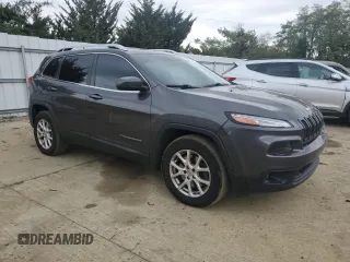 2014 Jeep Cherokee Altitude with VIN 1C4PJMCSXEW206494, listed as a Copart auction lot 74877164 with 183,549 mi miles and Salvage Title. Bid and sale history available at carsss.com. Image 4.