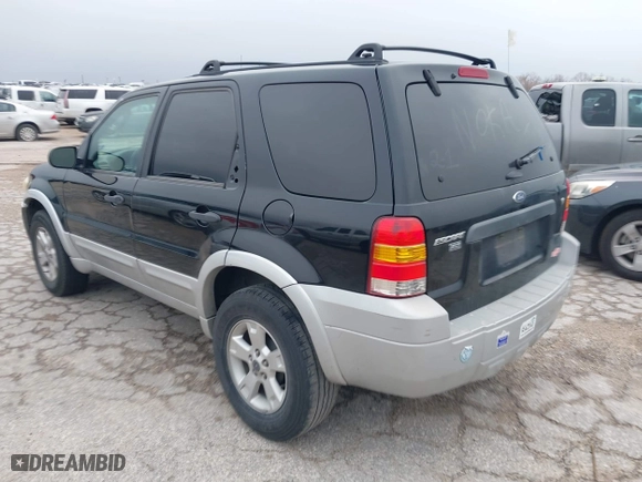 2007 Ford Escape XLT with VIN 1FMYU03107KA04717, listed as a IAAI auction lot 41418772 with 240,440 mi miles. Bid and sale history available at carsss.com. Image 3.