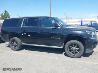 2015 Chevrolet Suburban LT with VIN 1GNSCJKC2FR281629, listed as a IAAI auction lot 41849300 with 133,842 mi miles. Bid and sale history available at carsss.com. Image 13.