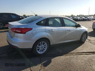 2018 Ford Focus SE z VIN 1FADP3F26JL278091, wystawiony jako Copart lot #63879875 z przebiegiem 81 984 mil mil oraz Czysty tytuł • Clean title. Historia ofert i sprzedaży dostępna na DreamBid. Obrazek 3.