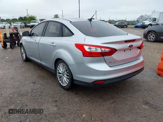 2012 Ford Focus SEL with VIN 1FAHP3H22CL102110, listed as a IAAI auction lot 41963966 with 151,538 mi miles. Bid and sale history available at carsss.com. Image 3.
