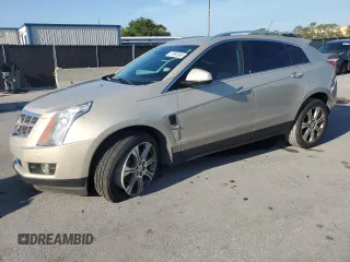 2012 Cadillac SRX Performance Collection z VIN 3GYFNBE31CS575922, wystawiony jako Copart lot #57992365 z przebiegiem 234 188 mil mil oraz Szkoda całkowita • Salvage title. Historia ofert i sprzedaży dostępna na DreamBid. Obrazek 1.