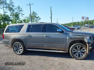 2019 Chevrolet Suburban LT with VIN 1GNSCJKC3KR129739, listed as a IAAI auction lot 42044708 with 105,771 mi miles and . Bid and sale history available at DreamBid. Image 13.