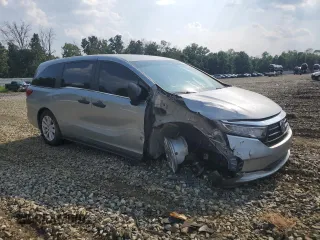 2021 Honda Odyssey LX с VIN 5FNRL6H27MB004951, выставлен на аукционе Copart как лот 65111854 с пробегом Не указан миль и На запчасти • Non repairable. История ставок и продаж доступна на DreamBid. Изображение 4.