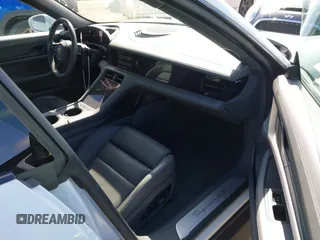 2021 Porsche Taycan 4S z VIN WP0AB2Y12MSA43873, wystawiony jako IAAI lot #41703233 z przebiegiem 24 452 mil mil oraz . Historia ofert i sprzedaży dostępna na DreamBid. Obrazek 5.