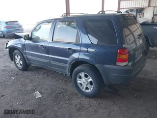 2004 Ford Escape XLT with VIN 1FMYU93194KA77634, listed as a IAAI auction lot 41663464 with 149,600 mi miles. Bid and sale history available at carsss.com. Image 3.