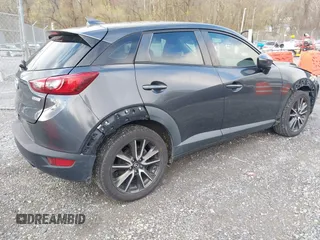 2017 Mazda CX-3 Touring with VIN JM1DKFC76H0175520, listed as a IAAI auction lot 41919185 with 105,346 mi miles and . Bid and sale history available at DreamBid. Image 4.