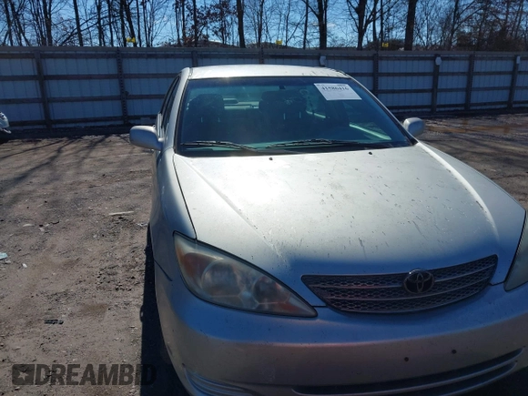 2002 Toyota Camry LE z VIN 4T1BE32K52U506649, wystawiony jako IAAI lot #41586416 z przebiegiem 312 245 mil mil oraz . Historia ofert i sprzedaży dostępna na DreamBid. Obrazek 6.