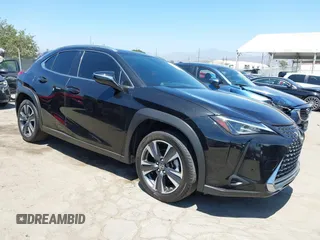 2022 Lexus UX 200 with VIN JTHX3JBH8N2047074, listed as a IAAI auction lot 42665051 with 27,249 mi miles and . Bid and sale history available at DreamBid. Image 1.