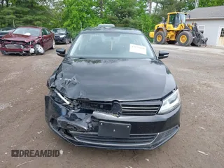 2013 Volkswagen Jetta SE with VIN 3VWDP7AJ6DM353839, listed as a IAAI auction lot 42237690 with 77,399 mi miles and . Bid and sale history available at DreamBid. Image 12.