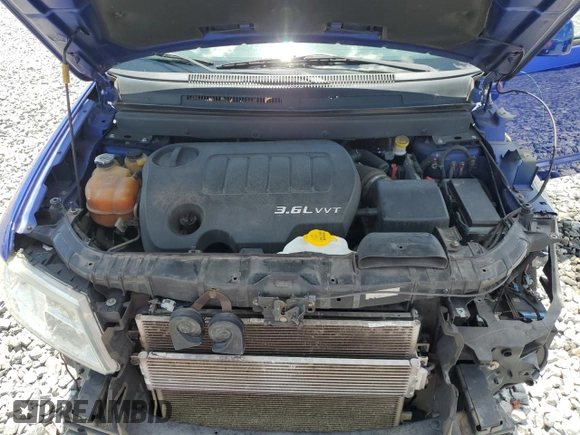 2012 Dodge Journey SXT with VIN 3C4PDCBG8CT231640, listed as a Copart auction lot 60625465 with 131,358 mi miles and Salvage title. Bid and sale history available at DreamBid. Image 12.