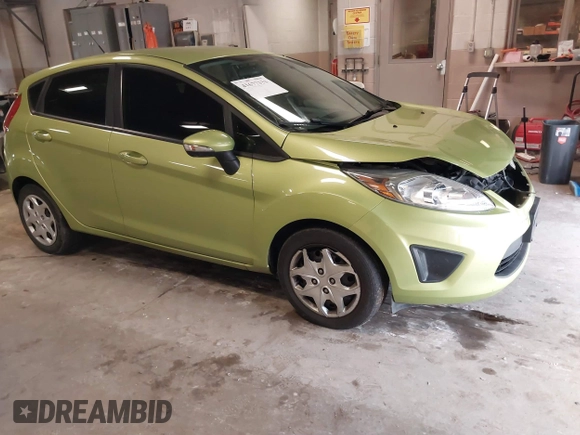 2013 Ford Fiesta SE with VIN 3FADP4EJ9DM131913, listed as a IAAI auction lot 41677333 with 54,673 mi miles. Bid and sale history available at carsss.com. Image 1.