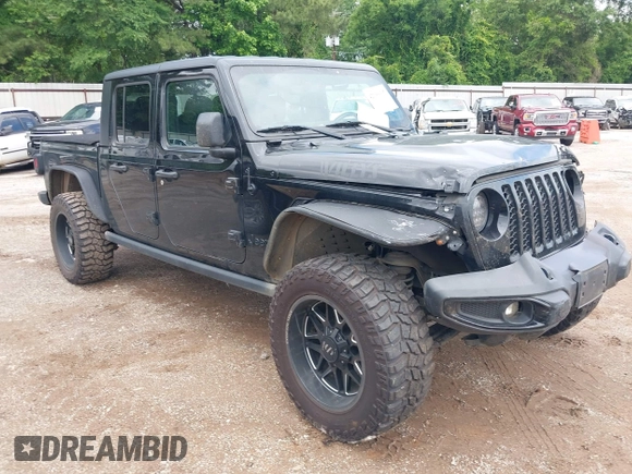 2021 Jeep Gladiator Sport S with VIN 1C6JJTAM7ML554412, listed as a IAAI auction lot 42199167 with 74,263 mi miles and . Bid and sale history available at DreamBid. Image 1.