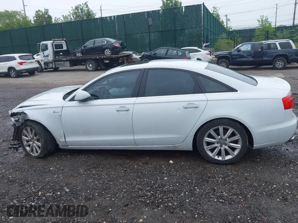 2014 Audi A6 Premium Plus z VIN WAUFGAFC4EN081900, wystawiony jako IAAI lot #42268150 z przebiegiem 150 238 mil mil oraz . Historia ofert i sprzedaży dostępna na DreamBid. Obrazek 14.