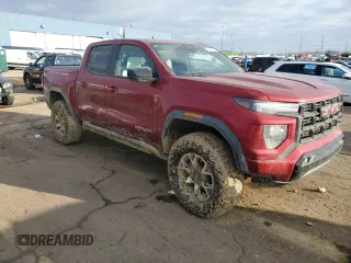 2024 GMC Canyon 4WD AT4X with VIN 1GTP6EEK9R1153150, listed as a Copart auction lot 82867754 with 2,140 mi miles and Salvage Title. Bid and sale history available at carsss.com. Image 4.