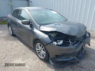 2018 Ford Focus SE with VIN 1FADP3F21JL214749, listed as a IAAI auction lot 42571395 with 58,764 mi miles and . Bid and sale history available at DreamBid. Image 1.