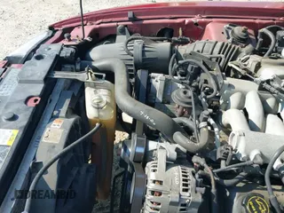 2004 Ford Mustang Standard z VIN 1FAFP40674F172486, wystawiony jako IAAI lot #42848540 z przebiegiem 189 360 mil mil oraz . Historia ofert i sprzedaży dostępna na DreamBid. Obrazek 14.
