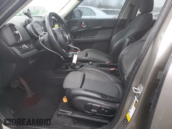 2017 MINI Countryman Cooper S with VIN WMZYT5C33H3D80073, listed as a Copart auction lot 87429094 with 83,566 mi miles and Salvage title. Bid and sale history available at DreamBid. Image 7.