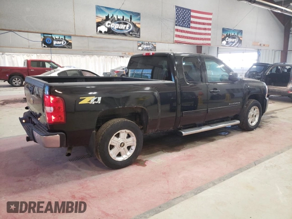 2013 Chevrolet Silverado 1500 LTZ with VIN 1GCRKTE72DZ414083, listed as a Copart auction lot 49009385 with 180,241 mi miles and Salvage Title. Bid and sale history available at DreamBid. Image 3.