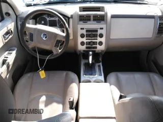 2008 Mercury Mariner Premier z VIN 4M2CU87128KJ53679, wystawiony jako Copart lot #54269815 z przebiegiem Nie podano mil oraz Szkody całkowita. Historia ofert i sprzedaży dostępna na DreamBid. Obrazek 8.