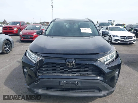2019 Toyota RAV4 XLE with VIN JTMW1RFV7KJ011556, listed as a IAAI auction lot 41682178 with 72,795 mi miles. Bid and sale history available at carsss.com. Image 12.