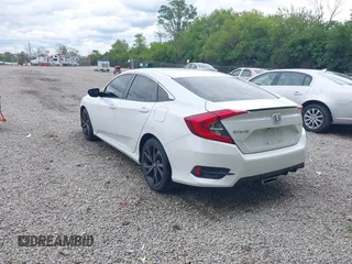 2019 Honda Civic Sport with VIN 19XFC2F85KE019311, listed as a IAAI auction lot 42319241 with 163,241 mi miles and . Bid and sale history available at DreamBid. Image 3.