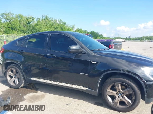 2014 BMW X6 xDrive35i with VIN 5UXFG2C5XE0C43526, listed as a IAAI auction lot 42121122 with 199,564 mi miles. Bid and sale history available at carsss.com. Image 13.