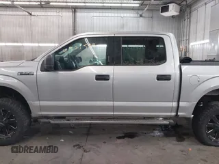 2015 Ford F-150 XLT with VIN 1FTEW1E89FFA44710, listed as a IAAI auction lot 41521584 with 158,297 mi miles. Bid and sale history available at carsss.com. Image 15.